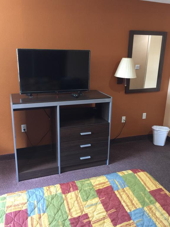 Scottish Inn & Suites Hobby Airport Хьюстон Экстерьер фото