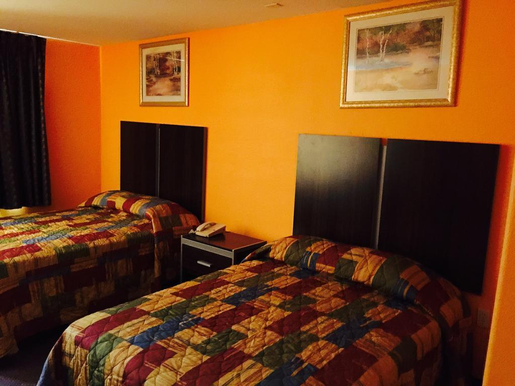 Scottish Inn & Suites Hobby Airport Хьюстон Экстерьер фото