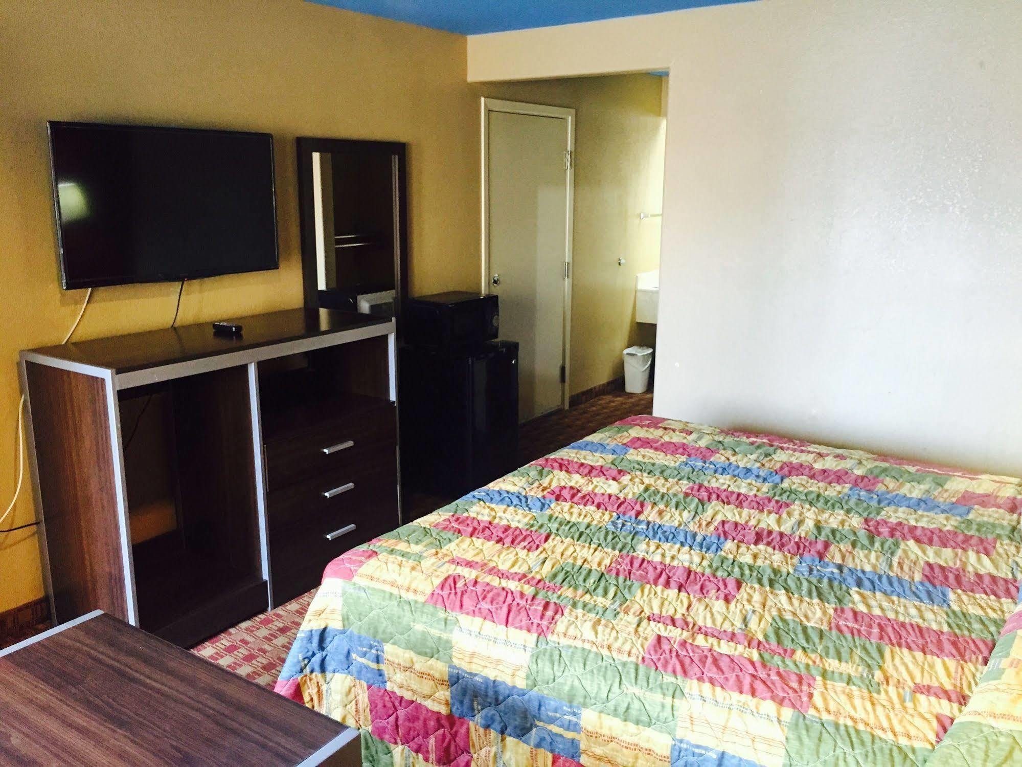 Scottish Inn & Suites Hobby Airport Хьюстон Экстерьер фото